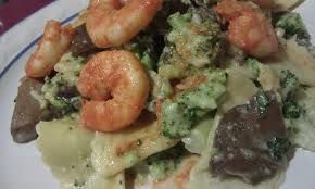 Langostinos con ravioles y níscalos