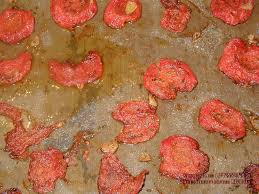 Sashimi de cigalas con jarabe de limón y sal de tomate