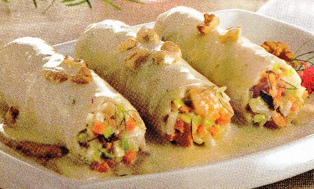 Canelones de marisco sobre coulis de setas, queso y nueces