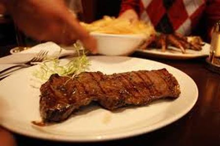 Cuadril en salsa de naranja